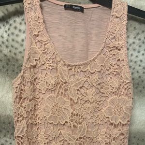 Boutique style tank.  Beautiful light peach in color.